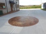 Circular feature in pattern imprinted concrete by GM Hard Landscapes, County Donegal, Ireland