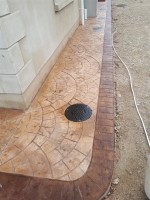 Path around house in brown hues - pattern imprinted concrete by GM Hard Landscapes, County Donegal, Ireland