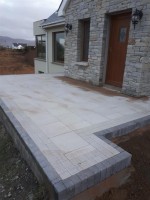 Stone patio around new build by  GM Hard Landscapes, Donegal, Ireland